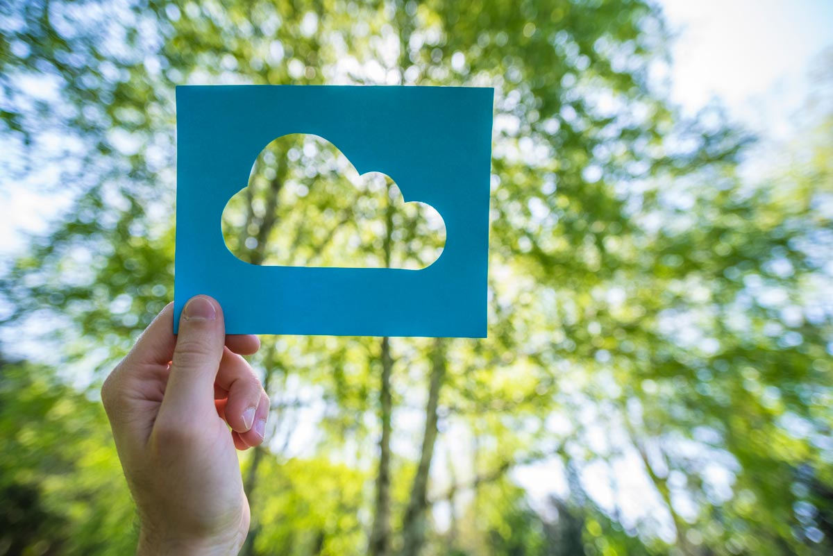 Hand holding cloud cutout template blog image